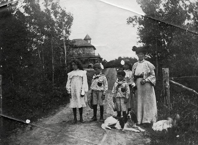 Adelaide Malcolm and Malcolm children by the Cairn